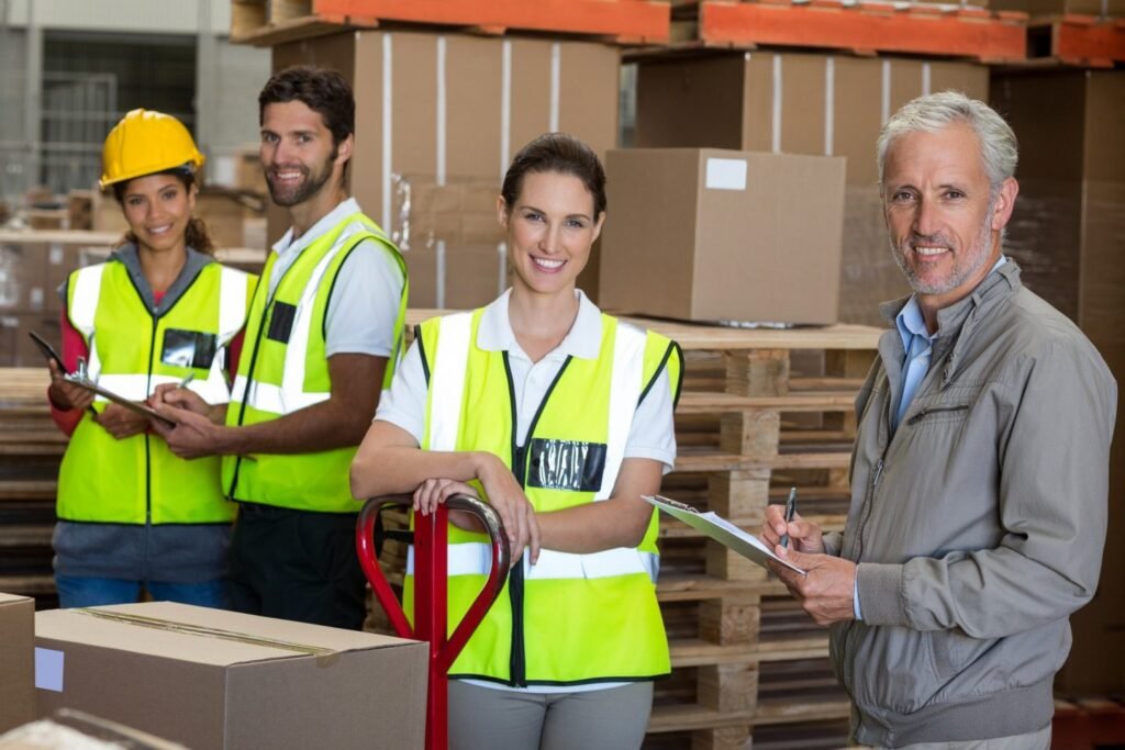 portrait-of-warehouse-manager-and-workers-preparing-a-shipment-e1607329913168.jpg